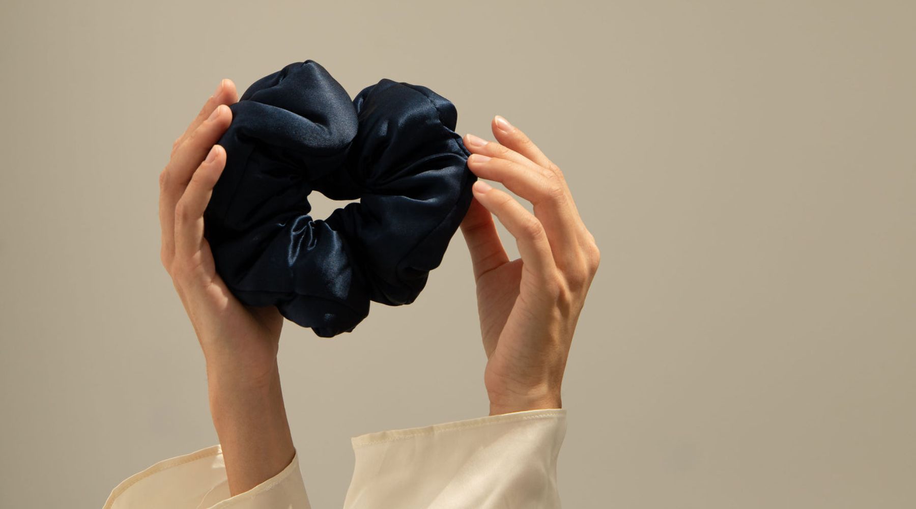 Satin vs silk scrunchies: which is better for your hair health?