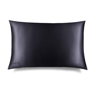 The Moonlight Shadow Silk Pillowcase by us.drowsysleepco features a smooth black rectangular design with a subtle sheen, ideal for skin and hair care, and has 