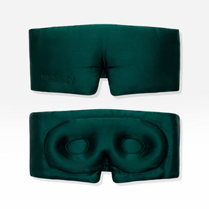 Two Ivy Green - Eyelash Protecting Masks by us.drowsysleepco are shown against a white background. One mask displays the exterior, featuring “DROWSY” embroidery, while the other reveals the interior with contoured eyecups and a nose cutout designed for eyelash protection.