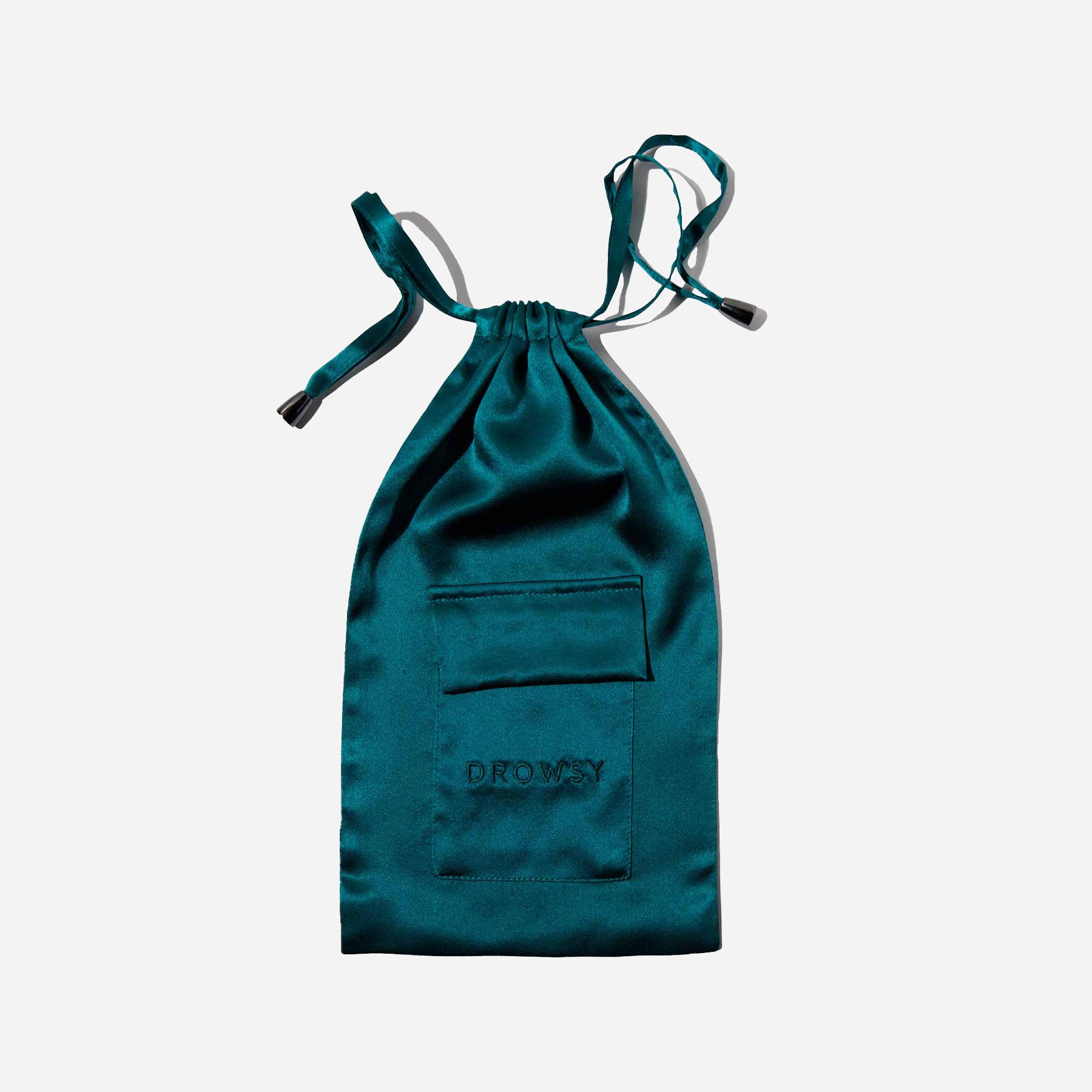 A teal satin drawstring pouch with a front pocket and the word DROWSY embroidered on it, photographed against a plain white background.