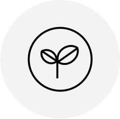 A simple black outline of a sprouting plant with two leaves inside a circle, centered on a light gray circular background.