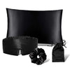 The drowsysleepco Sensual sleep bundle - Black Jade features a black satin pillowcase, eye mask, scrunchie, and drawstring pouch from their beauty sleep collection, all shown against a white background.