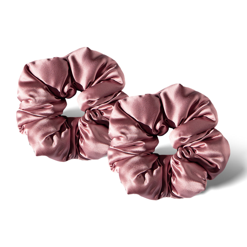 Two Damask Rose - Padded Scrunchies by us.drowsysleepco, large and shiny pink, rest side by side on a white background—ideal as oversized, gentle hair sleep accessories.