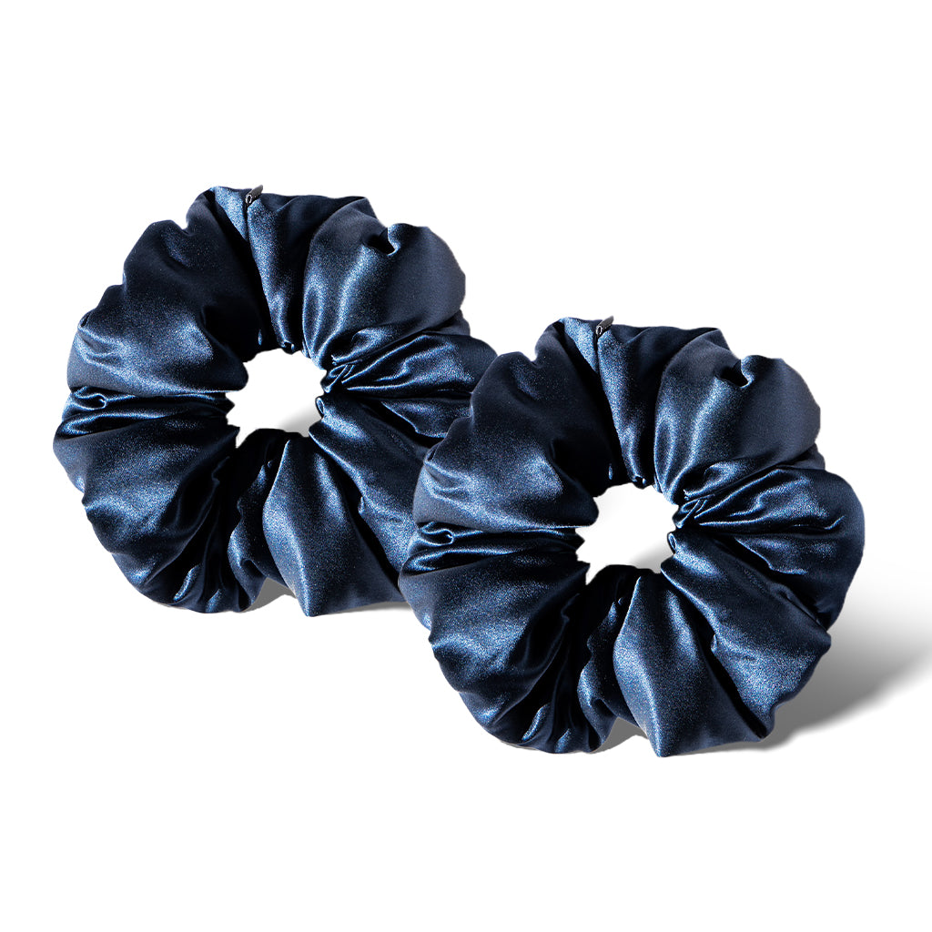Two Midnight Blue - Padded Scrunchies from us.drowsysleepco are displayed side by side on a white background, featuring soft, shiny silk and gathered edges—ideal for adding volume and supporting hair health.